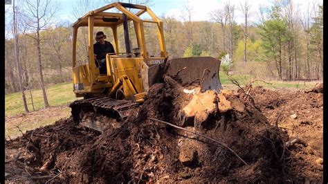 can a skid steer dig up stumps|pulling pine tree stumps.